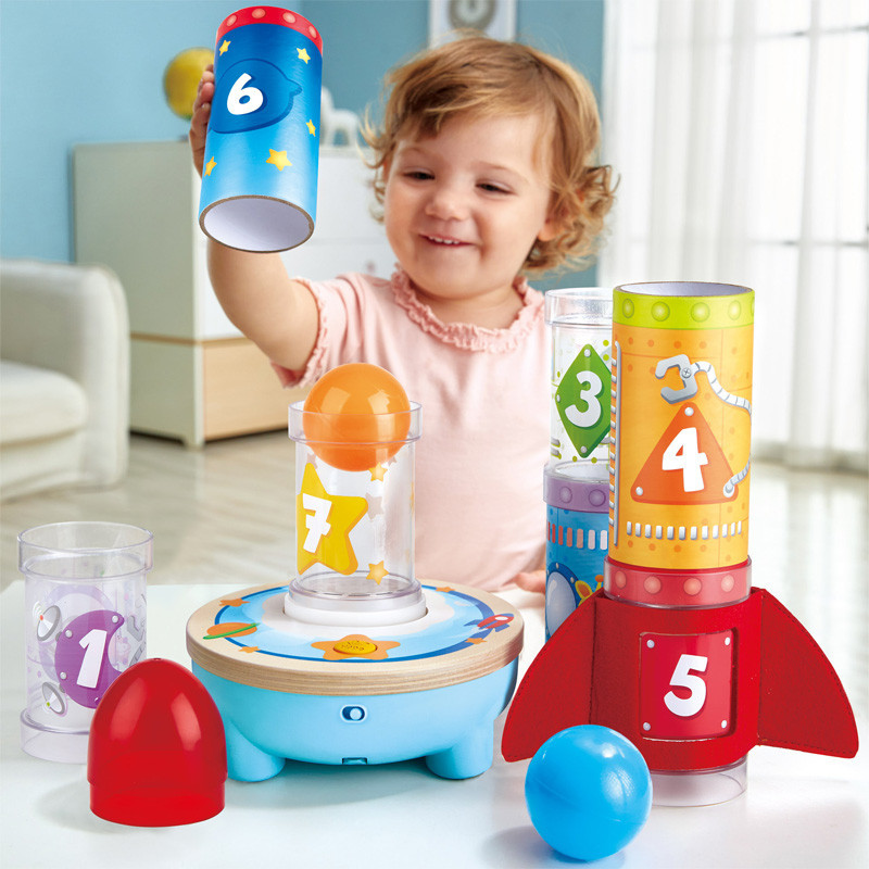 Girl Playing with Rocket Ball Air Stacker Toy