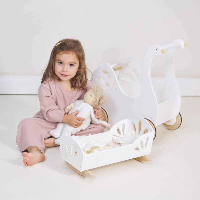 This rocking doll bed will make for gentle nights of putting little dollies and teddies to sleep.