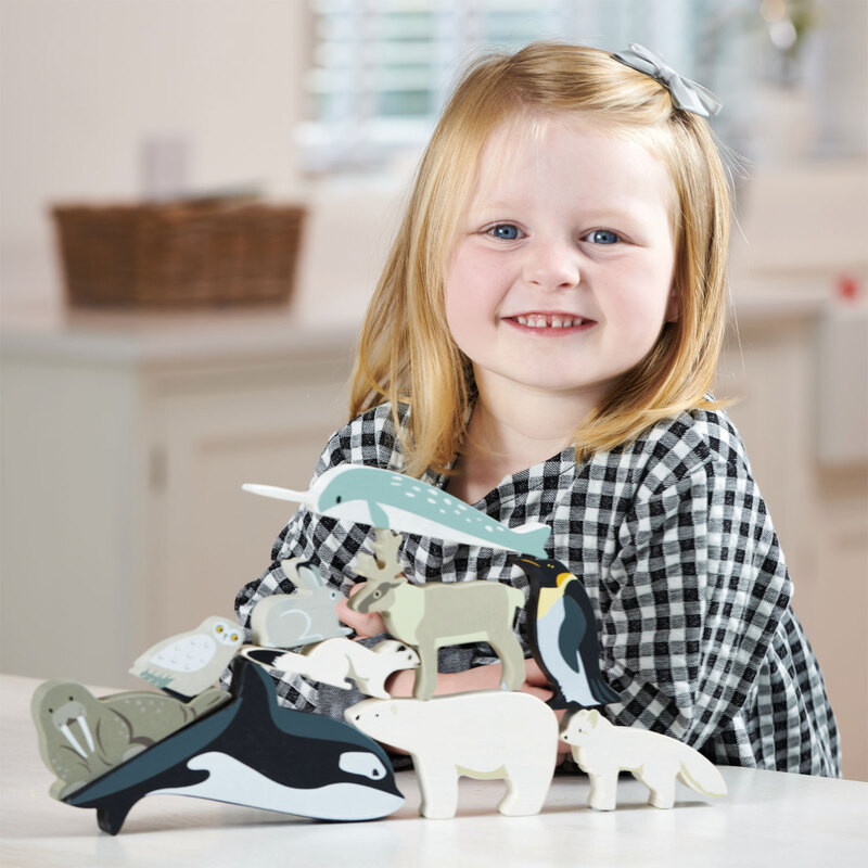 Wooden figurines foster open-ended, imaginative play.