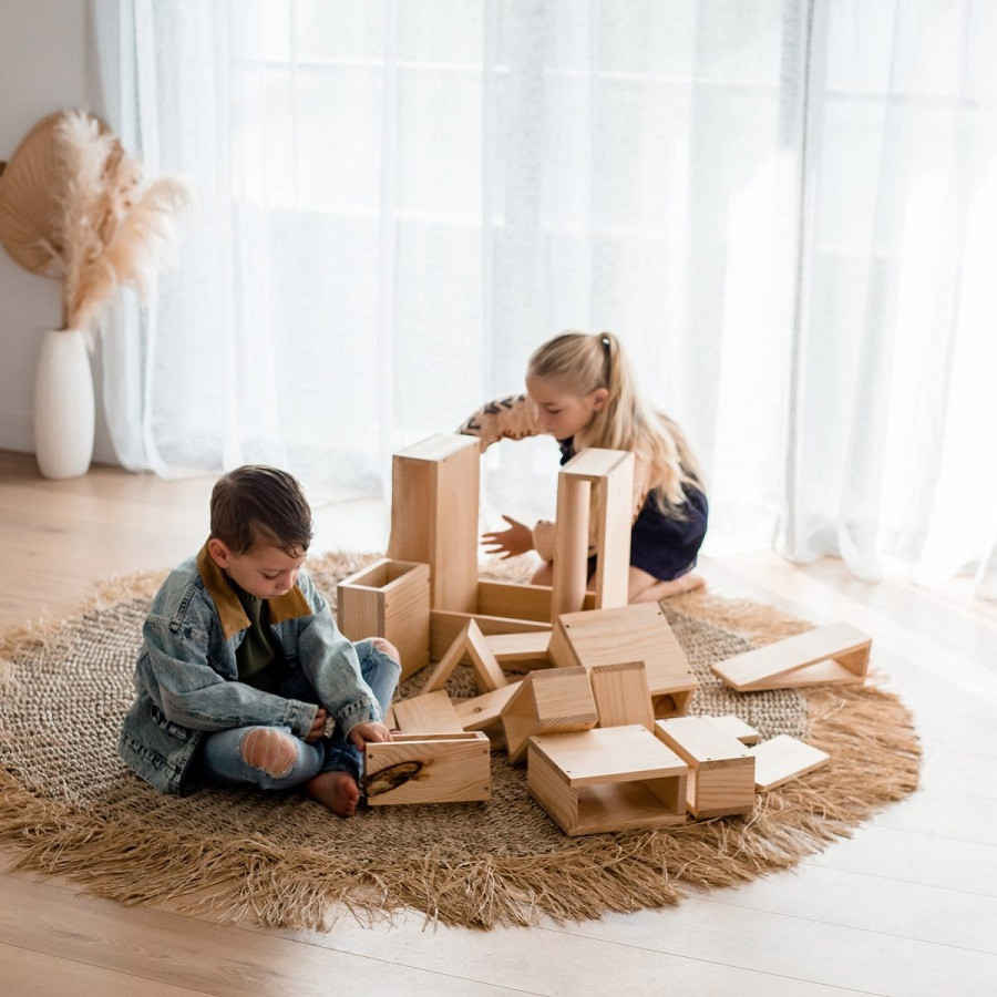 Children in collaborative play with Qtoys Unit Blocks