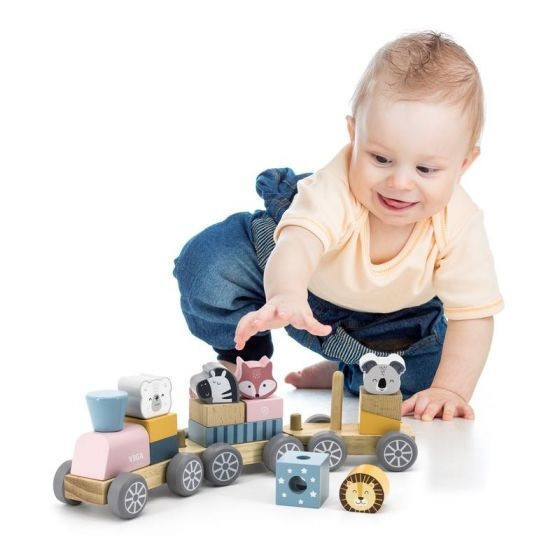 child playing with polarb animal stacking train