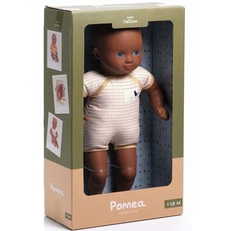 Djeco Dressable Pomea Soft Body Doll in Yellow standing in Box