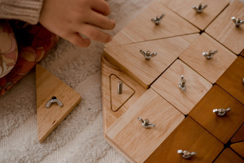 Qtoys Tactile Learning Board have interesting geometrical shapes
