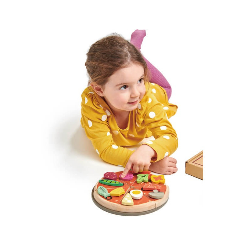 Child playing with Tender Leaf Pizza Party