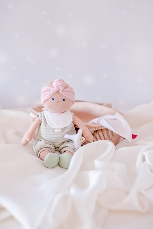 bonnika doll in green clothes