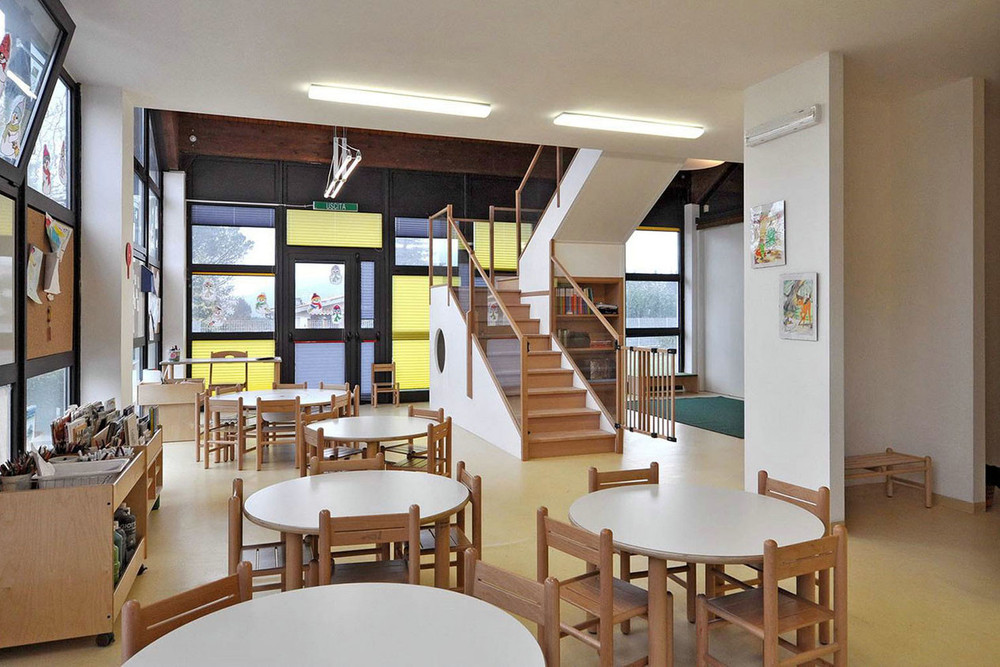 round wooden Montessori tables in early learning centre