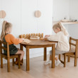large round table and standard chairs