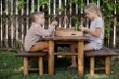 Qtoys Tree Top table and bench set small with kids outside