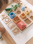 sensory play with wooden nesting and sorting board