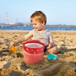 Hape Fold and Go Beach Set  boy playing