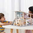 children playing with polar b holiday house