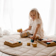 Child Playing with Qtoys Sound Blocks