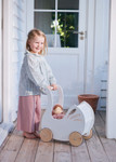 Pretend play with dolls is one of the most endearing ways that children play during early childhood.