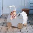 Pretend play with dolls is one of the most endearing ways that children play during early childhood.