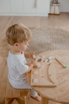 Child playing with Qtoys Teeth Puzzle