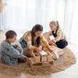 Children in collaborative play with Qtoys Unit Blocks