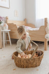 girl playing with Qtoys Wicker Basket