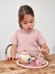 Child playing with Tender Leaf Birdie Tea Set