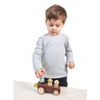 Child playing with Tender Leaf Timber Taxi