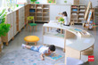 GAM Montessori Curved Half Open Shelf in learning centre