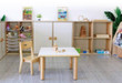 low square table with stackable chairs
