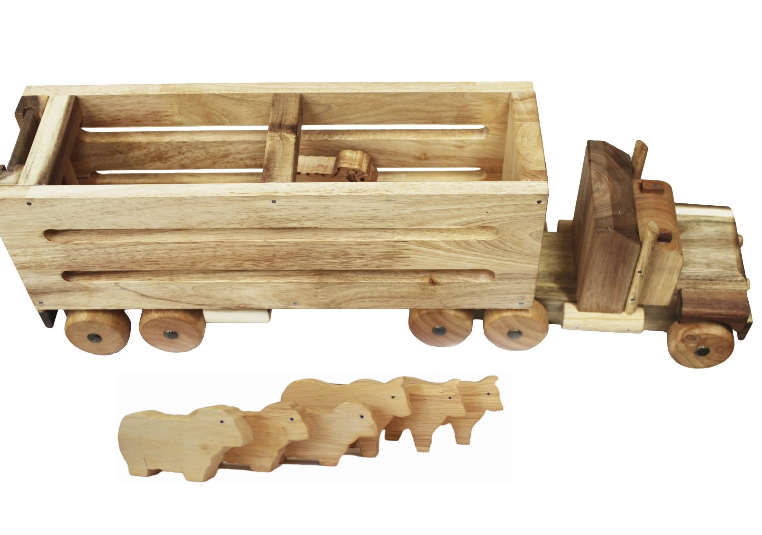 wooden cattle truck with cows and sheep