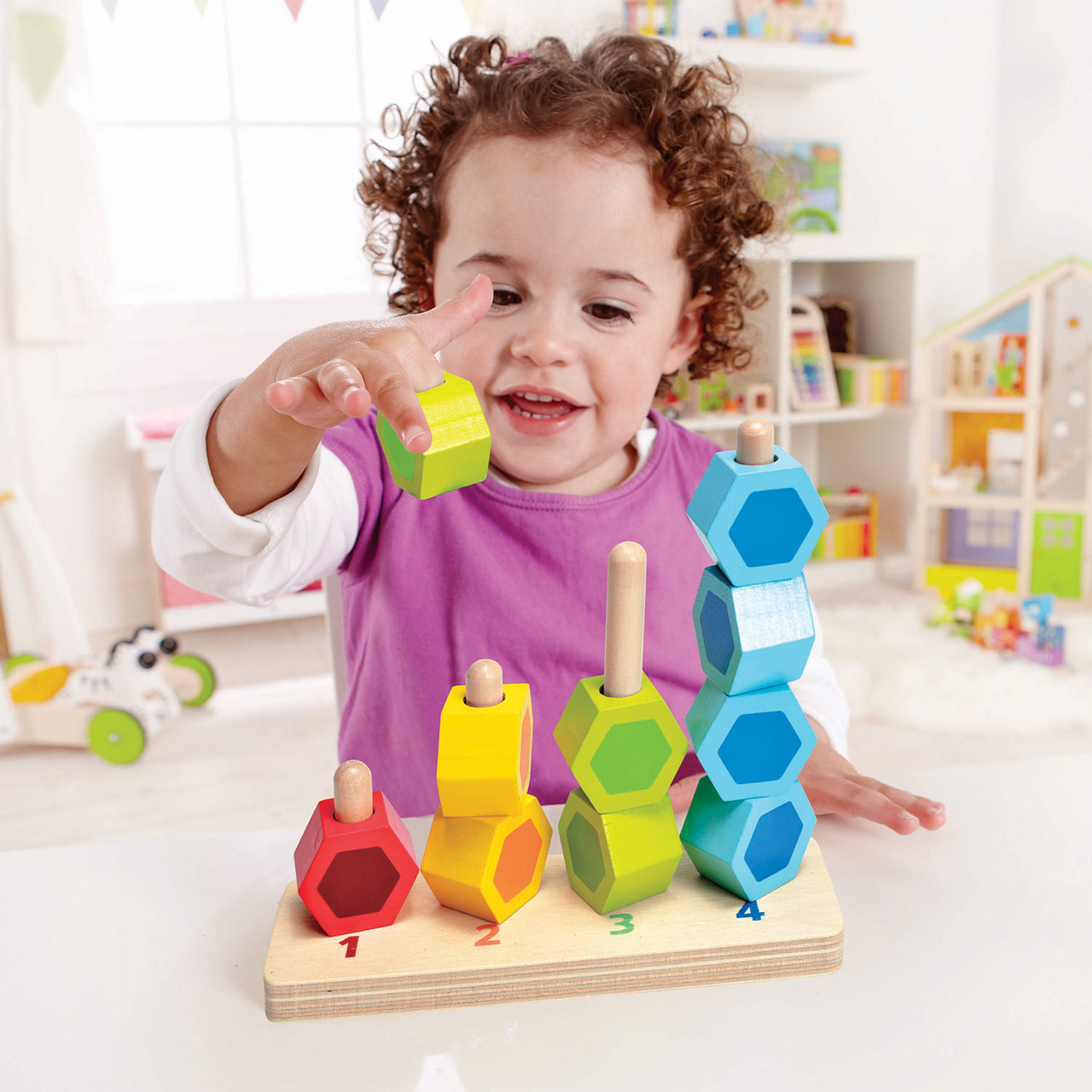 Hape Counting Stacker - Kid playing Hape Counting Stacker - Kid playing