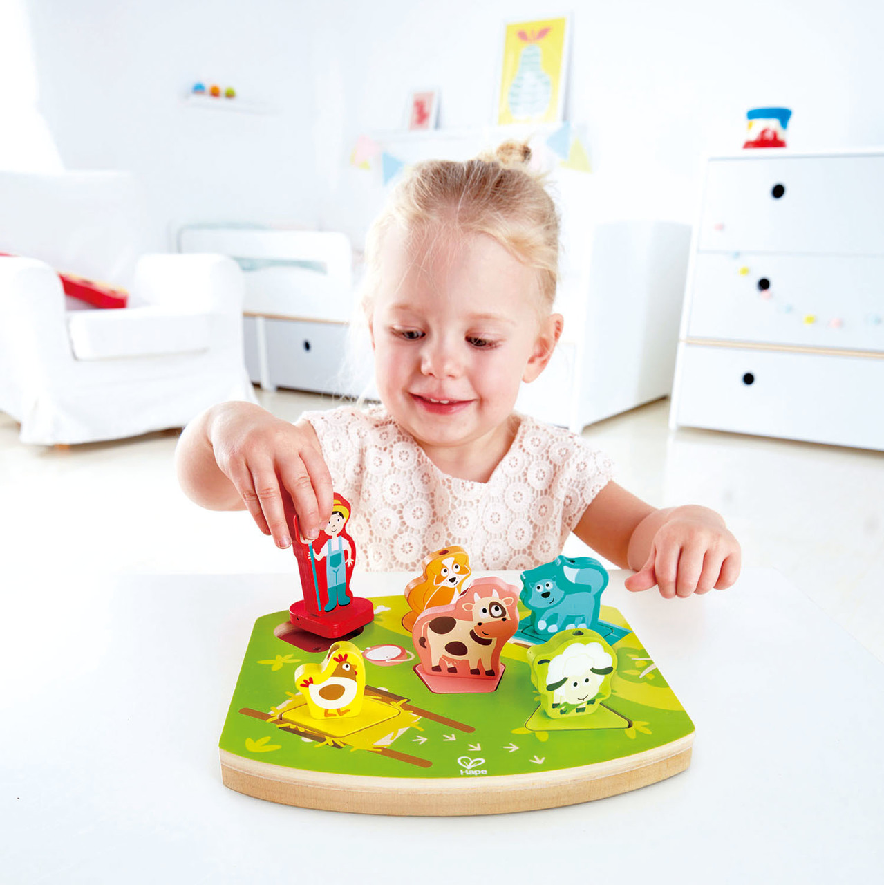 Hape Farmyard Sound Puzzle - Kid Playing Hape Farmyard Sound Puzzle - Kid Playing