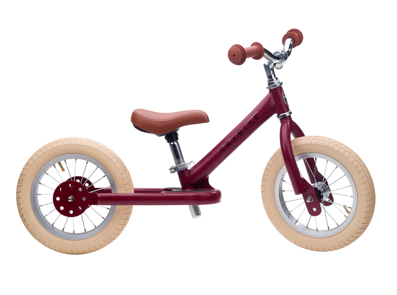 side view of red trybike side view of red trybike