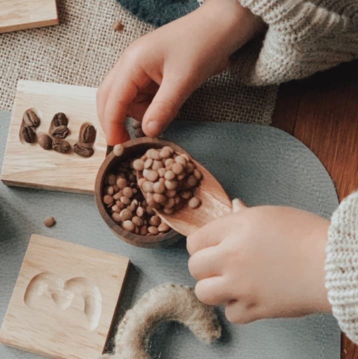 wooden spoon scrooping spoon