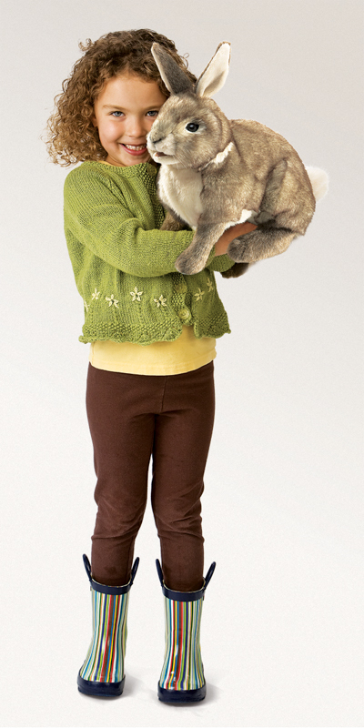 Girl Holding  Cottontail Rabbit Puppet Girl Holding  Cottontail Rabbit Puppet