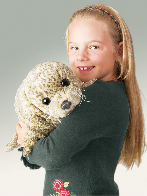 Girl Holding Harbour Seal Puppet