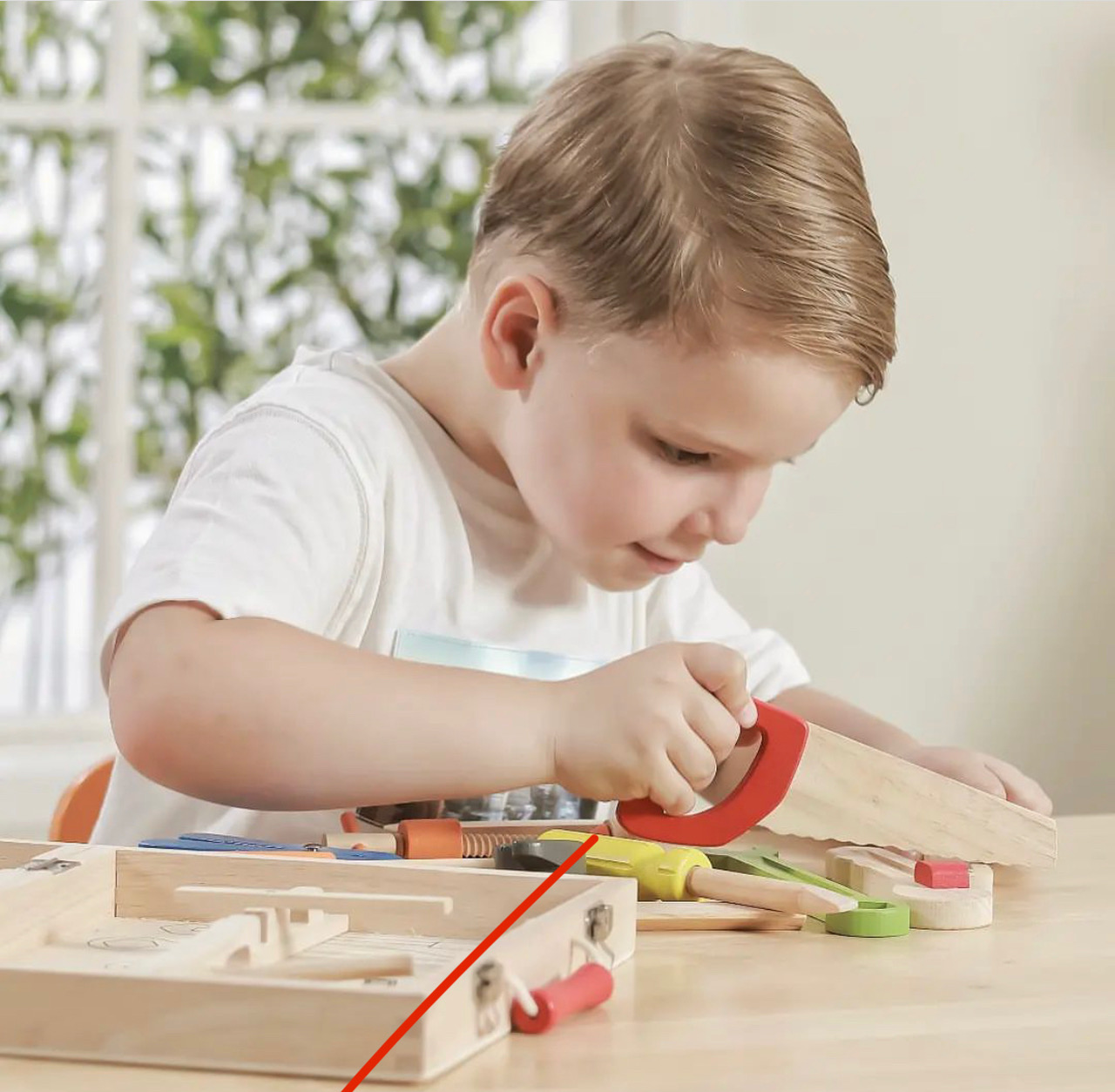 child playing with viga tool box child playing with viga tool box