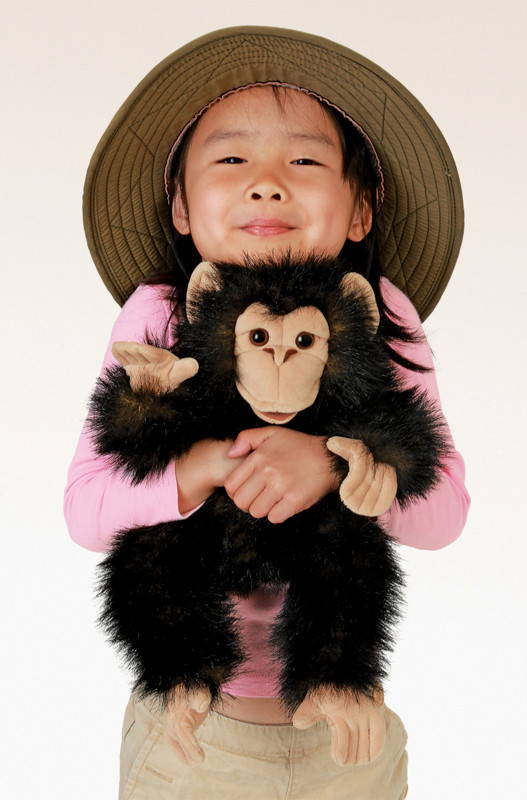 Girl Playing With Folkmanis Baby Chimpanzee Puppet