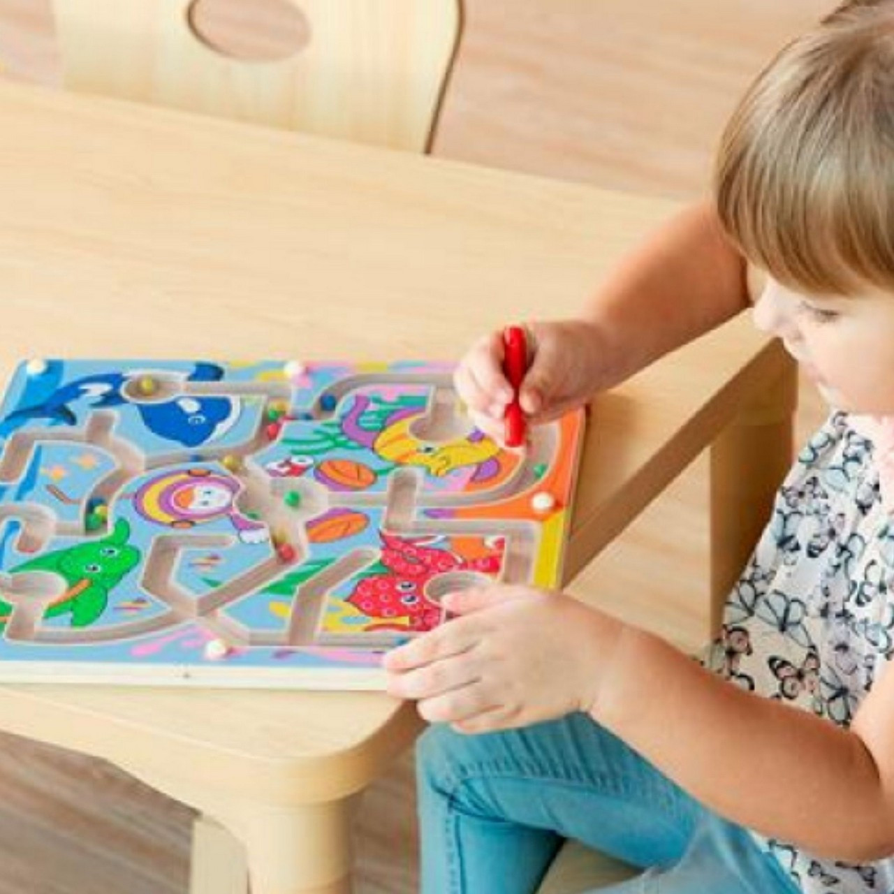Child Playing with Viga Marine Life Magnetic Bead Trace