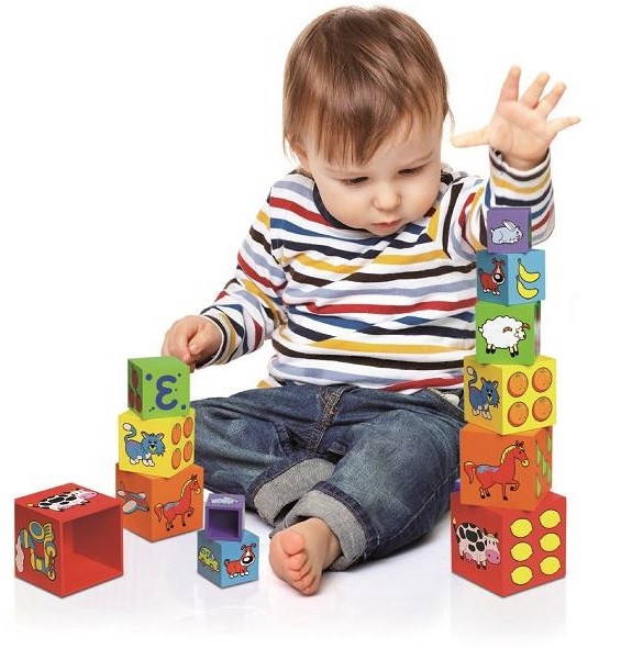Child playing with Viga Nesting & Stacking Blocks