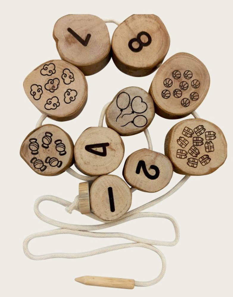 Made from natural wood branch cuttings, these double-sided lacing beads is your child\'s first foray into numeracy.