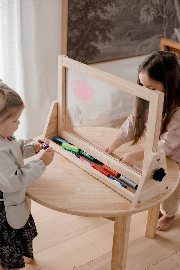 Children can collaborate on art using the Perspex board Children can collaborate on art using the Perspex board