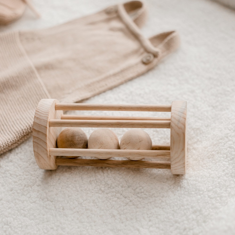 Qtoys Ball Rattle in natural finish houses 3 wooden balls Qtoys Ball Rattle in natural finish houses 3 wooden balls