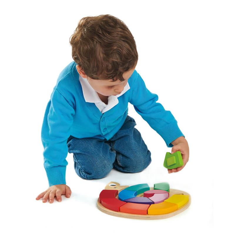 Child playing with Tender Leaf Colour Me Happy Wooden Worm Puzzle Child playing with Tender Leaf Colour Me Happy Wooden Worm Puzzle
