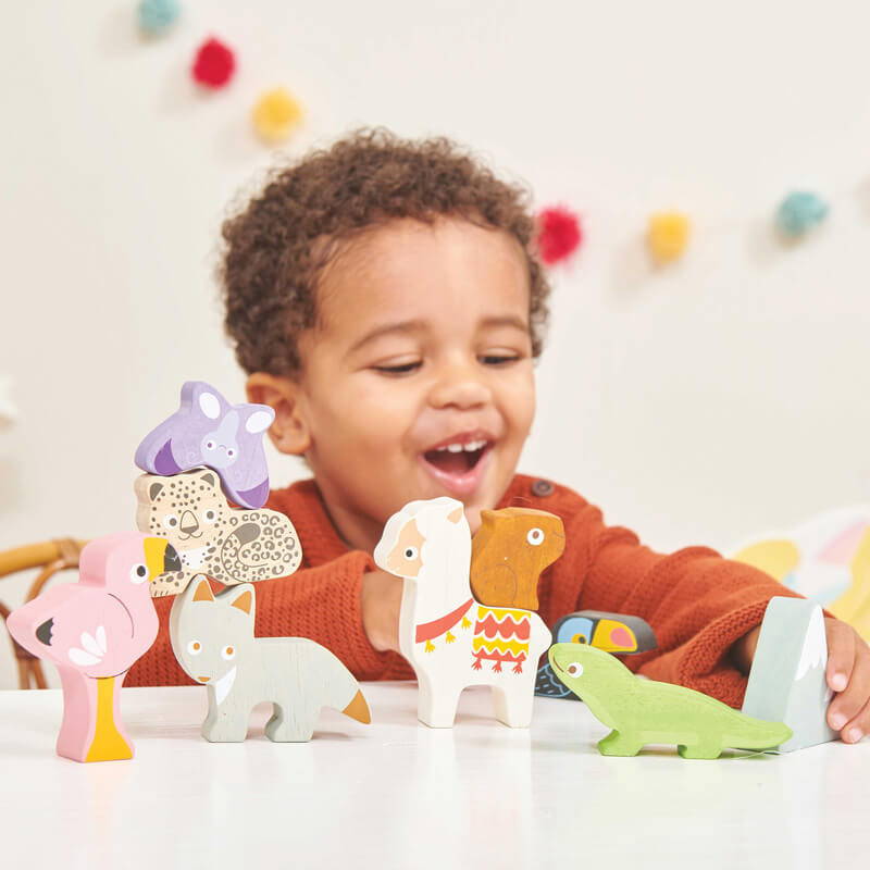 Child playing with Le Toy Van Petilou Andes Stacking Animals