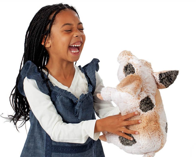 Child enjoying Folkmanis Grunting Pig Puppet