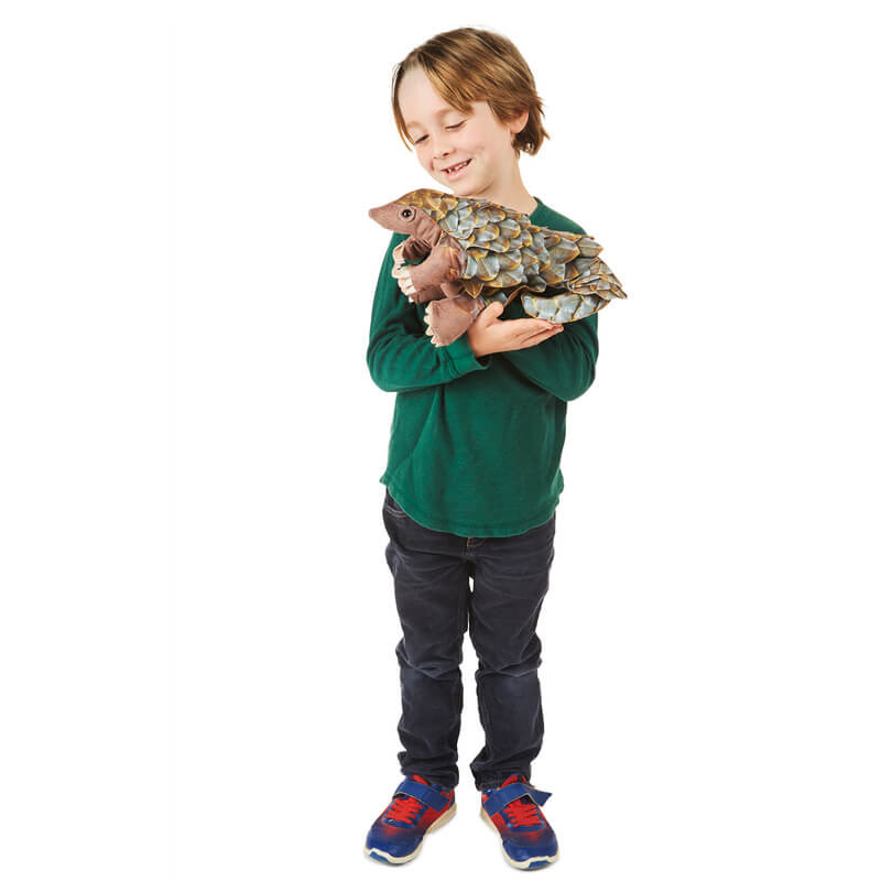 Child animating Folkmanis Pangolin Puppet