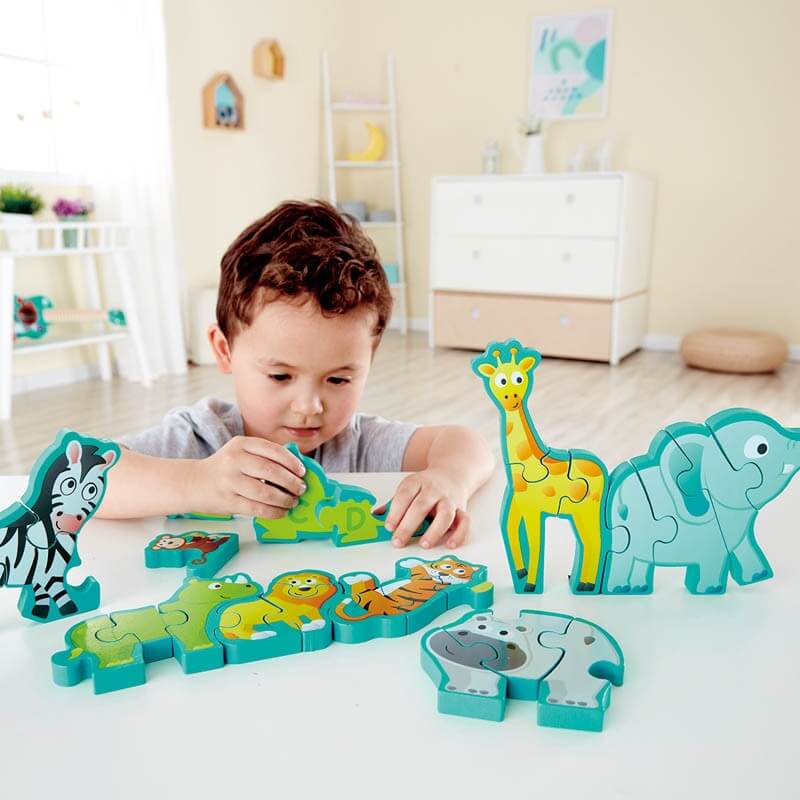 Child playing with Hape Alphabet & Animal Parade Child playing with Hape Alphabet & Animal Parade