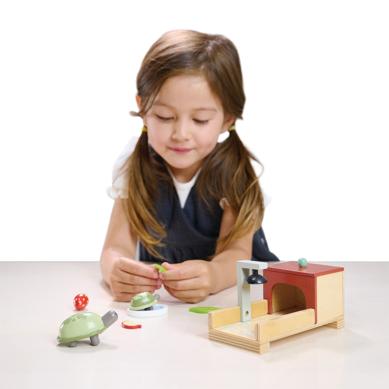 Child playing with Tenderleaf Tortoise Pet Set Child playing with Tenderleaf Tortoise Pet Set
