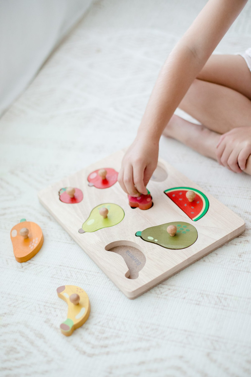 Qtoys Fruit Knob Puzzle on the floor