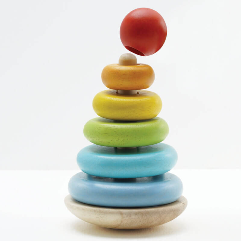 Le Toy Van Petilou Rainbow Stacker has a round red topper Le Toy Van Petilou Rainbow Stacker has a round red topper
