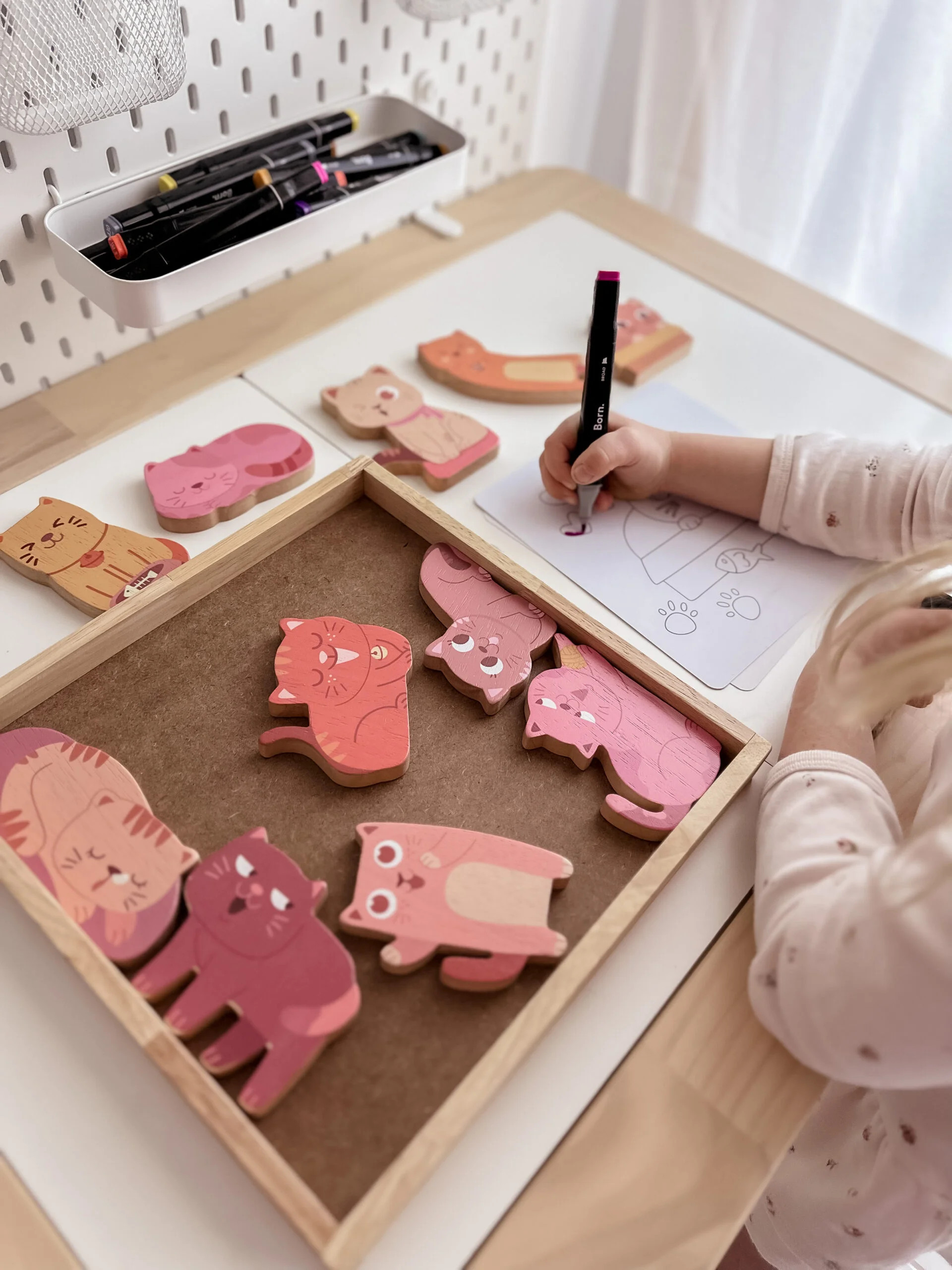 wooden cat figurines and colouring set