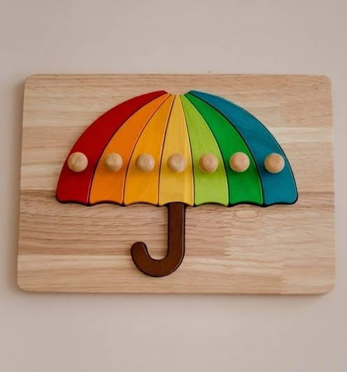 wooden umbrella peg puzzle