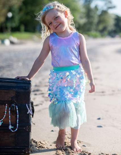 girl wearing mermaid costume